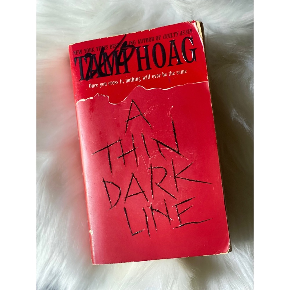 A THIN DARK LINE by Tami Hoag